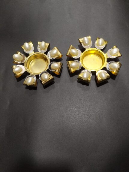 gold metal diya