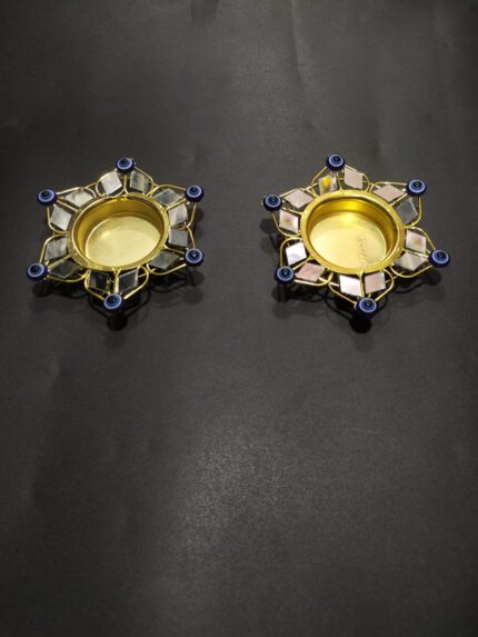 metal gold diya and mirrer